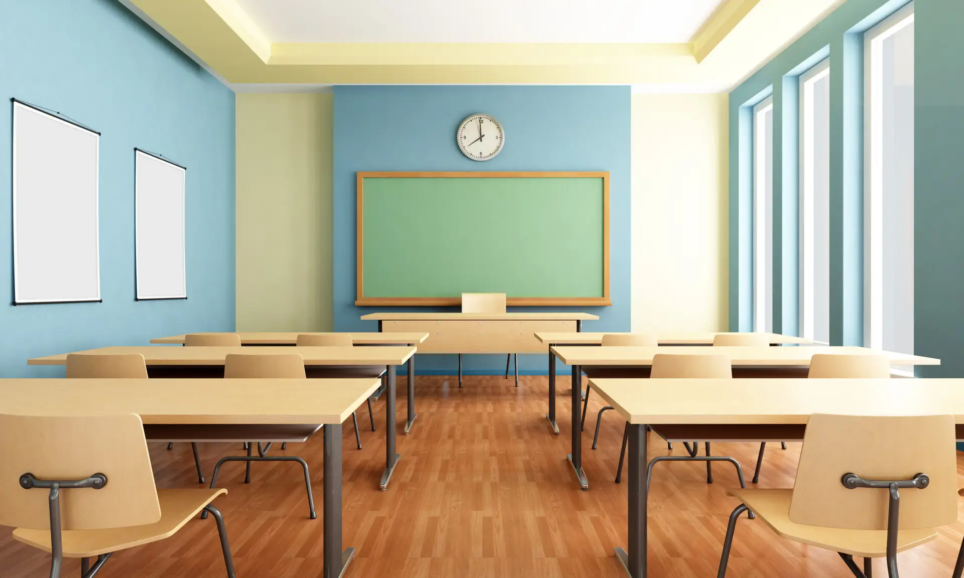 a classroom with desks and a chalkboard